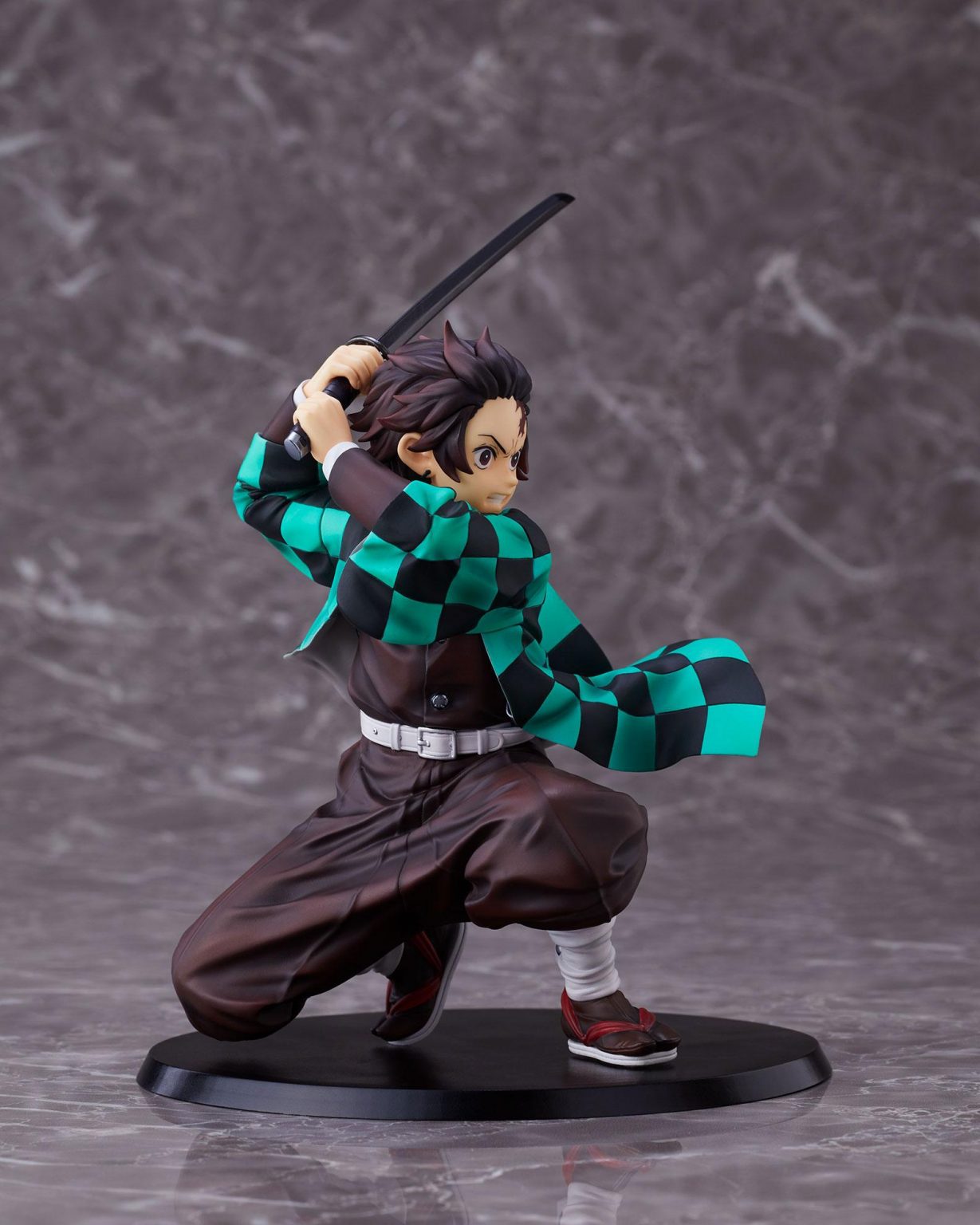 tanjiro statue with animated background