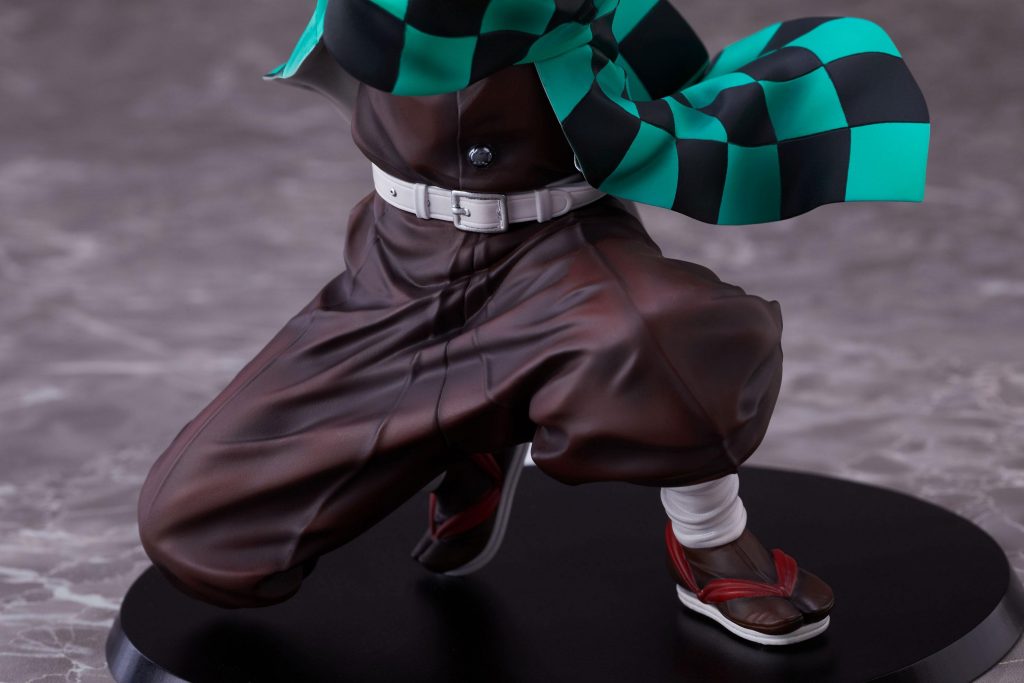 tanjiro statue with animated background